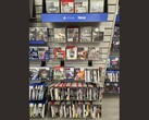 Een gangpad bij GameStop vol met fysieke PS3-spellen