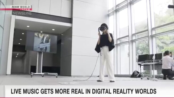 De Canon mixed-reality headset voor muzikale optredens projecteert video's van tot wel 50 camera's in een lichtgewicht, vastgemaakte MR-headset. (Bron: NHK World News)