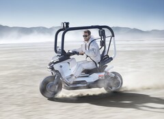 De BMW Vision CE 01 beweert helmen en beschermende uitrusting te vervangen door de vertrouwde veiligheidsgordel en rolkooi (Afbeelding bron: BMW)