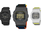 Afgebeeld - de Casio G-Shock DW-5600MNC-1, DW-5600MNC-BA2 en DW-5600MNC-7A8 tegen een witte achtergrond.