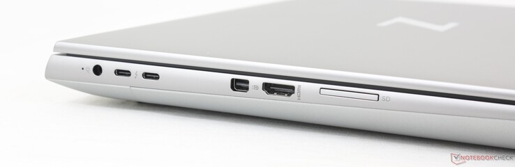 Links: AC-adapter, 2x USB-C 3.2 Gen. 2 w / Thunderbolt 4 + DisplayPort 1.4 + DisplayPort 1.4, mini-DisplayPort 1.4, HDMI 2.1, SD-kaartlezer. Let op de dicht op elkaar geplaatste USB-C en AC-adapterpoorten
