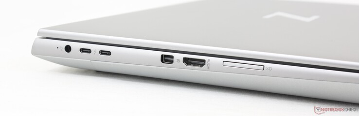 Links: AC-adapter, 2x USB-C 3.2 Gen. 2 met Thunderbolt 4 + DisplayPort 1.4, mini-DisplayPort 1.4, HDMI 2.1, SD-kaartlezer. Let op de dicht op elkaar geplaatste USB-C en AC-adapterpoorten