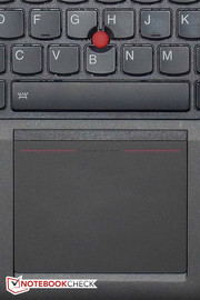 Het touchpad en het trackpoint.