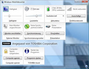 ... de Toshiba presentatie knop, die het door Toshiba aangepaste Windows Media Centre opstart.