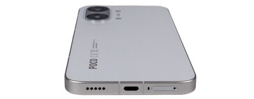 Onder: luidspreker, USB, microfoon, SIM
