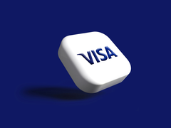 Het Visa-logo, gestileerd tegen een blauwe achtergrond.