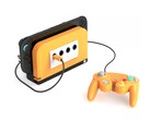 De Retro Fighters BattleDock met een kruidig oranje voorpaneel. (Afbeeldingsbron: Retro Fighters/Kickstarter)