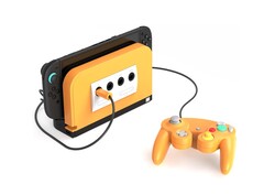 De Retro Fighters BattleDock met een kruidig oranje voorpaneel. (Afbeeldingsbron: Retro Fighters/Kickstarter)