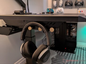 Drie haken aan elke kant om accessoires aan op te hangen.
