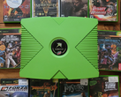 Een groen gekleurde Xbox met 10 retro Xbox titels afgebeeld