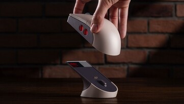 De 8BitDo Retro R8 Mouse - N Edition wordt geleverd met een oplaaddock. (Afbeeldingsbron: 8BitDo)