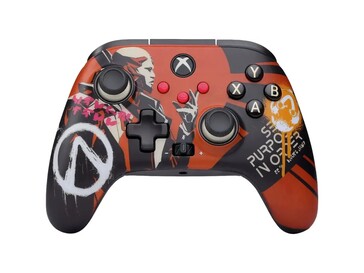 De Borderlands 4-controller heeft een oranje en zwart kleurenschema met muurschilderingen en logo's uit het spel. (Afbeeldingsbron: PowerA)