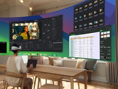 Een gebruiker bedient een virtuele desktop met de Apple Vision Pro headset (Afbeeldingsbron: Apple)
